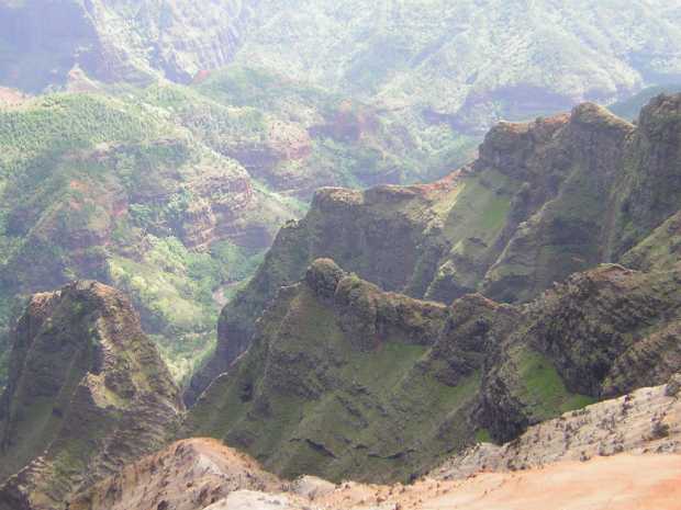 Beyond and below a set of rough crags coated here and there with a thin skin of green moss, a tiny, distant brown stream winds between steep wooded banks. Beyond and below a set of rough crags coated here and there with a thin skin of green moss, a tiny, distant brown stream winds between steep wooded banks.